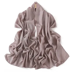 Detailed view of shimmery chiffon scarf featuring delicate sparkling rhinestone embellishments.