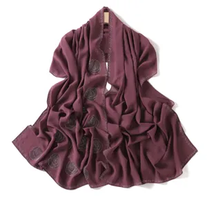 Elegant plum chiffon hijab with sparkling rhinestone details, perfect for stylish women.
