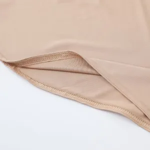 Close-up detail of smooth milk silk fabric edge and neat stitching for solid color head cover.