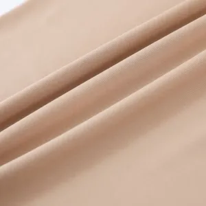 Milk silk head cover fabric detail, soft skin-friendly material, smooth surface texture wrap.