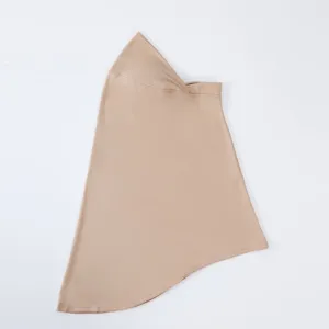 Detail view of the solid color milk silk headscarf showing smooth texture and neat stitching edge.
