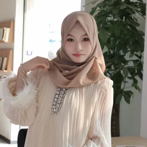 Detailed showcase of the chiffon hijab, inner cap, and rhinestone pleated top details.