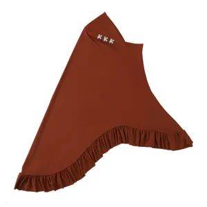 Detailed view of solid color crystal linen swallowtail hijab with ruffled hem and crystal letters.