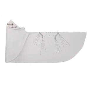 Detail shot of white headscarf with sparkling rhinestones, delicate chains and floral accents.