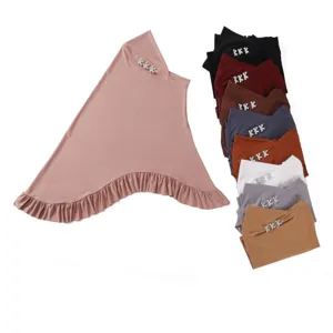 Solid color swallowtail instant hijab with pleated ruffle hem and rhinestone letter decor.