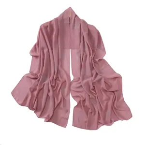 Close-up detail of the elegant rhinestone polka dot chiffon scarf showing crystal accents.