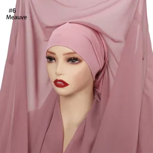 Detailed view of the solid color chiffon hijab scarf and matching under cap set in mauve.