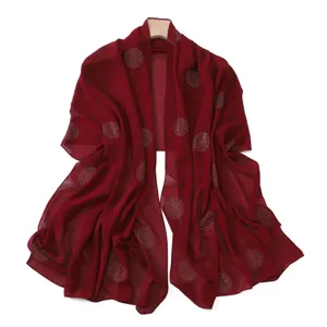 Detailed view of women's wine red rhinestone polka dot chiffon scarf and elegant shawl.