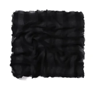 Black crinkled square scarf detail showing delicate lettuce edge and soft breathable fabric.