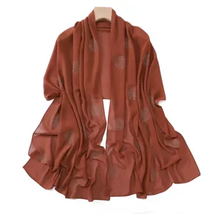 Elegant brown chiffon scarf with sparkling rhinestone polka dots, lightweight and versatile for daily wear.