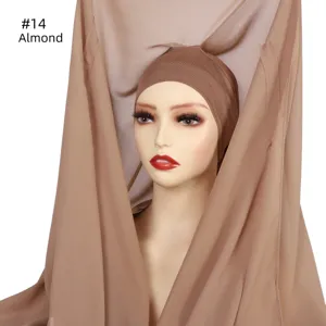 Detailed view of the almond chiffon hijab scarf and matching inner cap set on a mannequin.