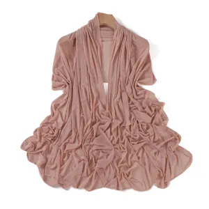Rhinestone mesh shawl for women, sheer pink fabric with sparkling crystals, elegant wrap.