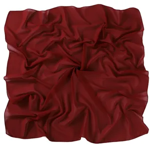 Close-up detail of the dark red pearl chiffon square scarf showcasing soft texture and drape.