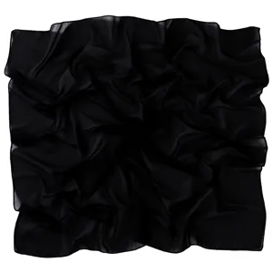 Detail view of a solid black chiffon square scarf, showing soft fabric texture and fine edge.