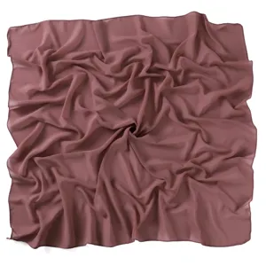 Detailed close-up view of solid color pearl chiffon square scarf showing soft drape texture.