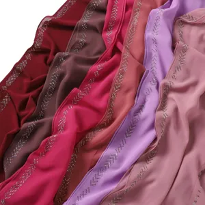 Chiffon scarf detail featuring sparkling rhinestone chain edging, elegant long hijab and shawl.