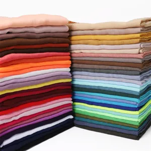 Detailed view of multi-color solid long scarves, lightweight fabric for daily wear and travel.