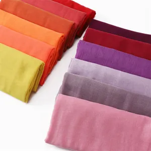 Detailed view of lightweight solid color polyester voile long scarf in vibrant multicolored options.