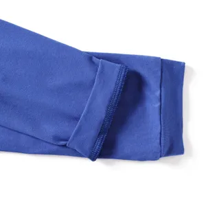 Close-up detail of blue solid color sun protection arm sleeve cuff showing neat fine stitching.
