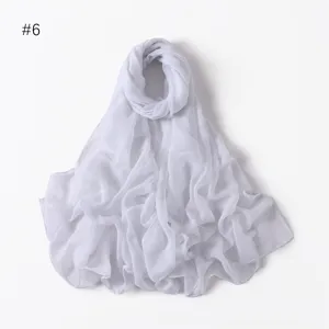 Detailed view of a lightweight solid color sheer long scarf, perfect for travel and daily wear.