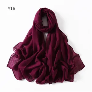 Solid color polyester long scarf lightweight travel shawl versatile monochrome neck wrap.
