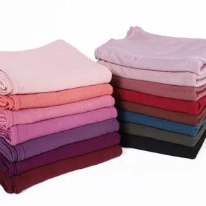 Solid color modal long scarf fabric detail, soft skin-friendly hijab textile material.