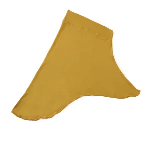 Mustard yellow modal hijab under scarf cap detail view, comfortable breathable stretch cap.