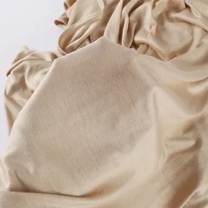 Premium modal jersey hijab fabric detail, soft breathable solid color stretch headscarf material.