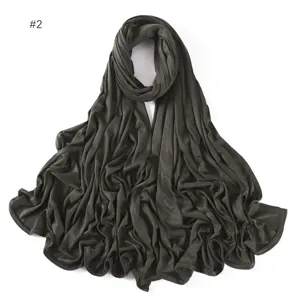 Detail view of the dark grey modal jersey hijab scarf, showing soft fabric texture and neat drapes.