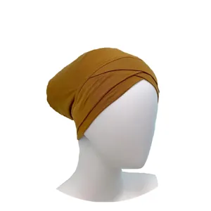 Detailed view of solid color modal cross inner cap hijab under scarf, breathable fabric.