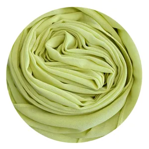 Light green chiffon hijab detail, soft plain long scarf for women daily wear style.