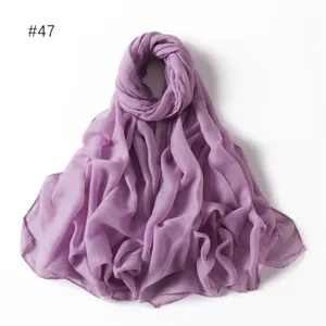 Solid color thin voile polyester long scarf, elegant drape for travel and daily wear.