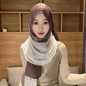 Detailed view of the gradient satin hijab, featuring a shimmering smooth texture and elegant drape.