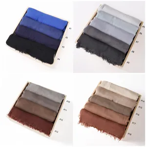 Detailed view of solid color rayon pleated scarf swatches showing color options.