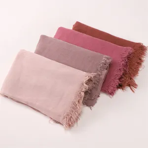 Detailed view of soft rayon fringed scarves in various elegant solid colors for daily wear.