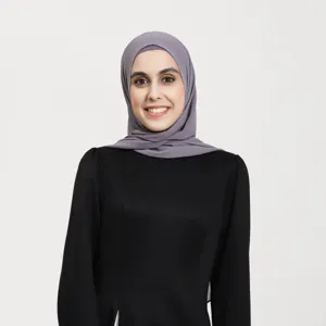 Detail view of the elegant grey chiffon hijab and black long sleeve top two-piece set.