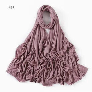 Detailed view of the soft modal jersey hijab scarf in a stylish mauve solid color texture.