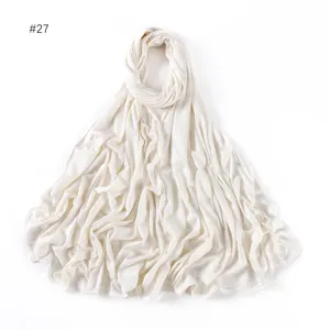 Detailed view of the soft modal hijab scarf fabric texture in elegant solid off-white color.