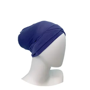Detail view of the solid blue modal cross wrap inner hijab cap, showing texture and design.