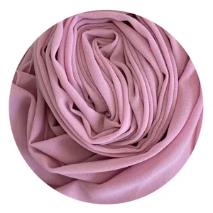 Pink chiffon hijab fabric detail, soft texture and solid color design for daily wear.