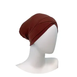 Detailed view of the brown modal cross hijab cap inner undercap, comfortable and breathable.