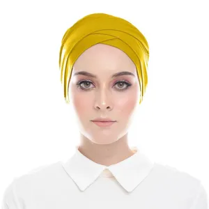 Solid color modal cross hijab inner cap detail view showing the soft fabric and unique twist style.