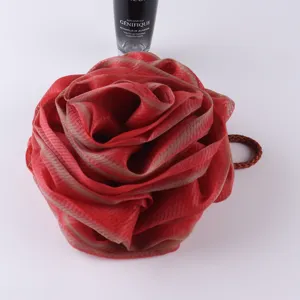 Rose shaped mesh bath sponge for rich lather, soft body scrubbing puff for women shower use.