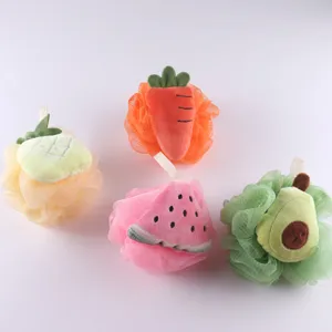 Detailed view of cute fruit shower sponges featuring soft mesh and adorable plush decorations.