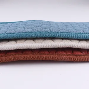 Thickened double-sided exfoliating back scrubber bath towel detail, solid color textured design.