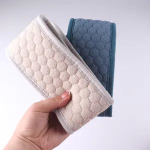 Double-sided textured exfoliating bath back scrubber towel for gentle skin cleansing detail