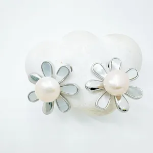 Elegant flower pearl earrings with mother of pearl inlay and metallic silver finish, stylish chic.