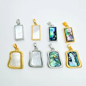 Geometric shell necklace pendant detailed view, featuring gold and silver plated metal frames.