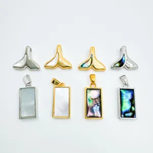 Exquisite copper-plated jewelry pendants featuring whale tail and rectangular pearl designs.