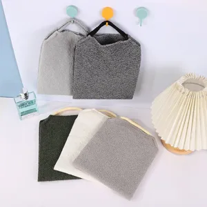 Detail view of elastic bath exfoliating towels and back scrub strips in assorted colors for daily use.